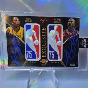 May include: A 1 of 1 Exquisite Dual Logoman trading card featuring Kobe Bryant and Michael Jordan. The card displays two holographic NBA logos with the number 75, blue ink autographs from both players, and team names Lakers and Bulls.