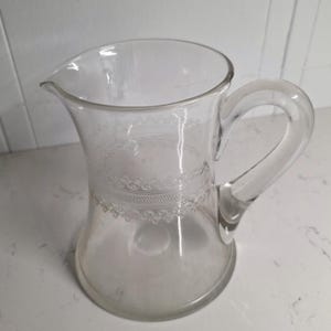 Antique Hand-Blown Clear Glass Pitcher with Etched Design