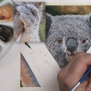 The animal is now covered in a dark grey fur, Paul is holding his brush over the hand and his palette of paints is shown to the left.