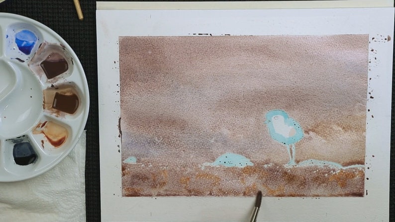 Paul is painting the background wash in this photo.  This is soft pinks and browns in the top half, the bottom is slightly darker and more mottled.