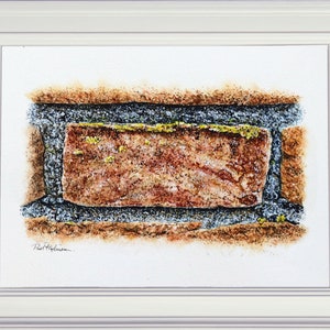 The finished brick painting in a white frame. The study focuses on a single brick with the mortar and the suggestion of other bricks around the edge. The brick is terracotta, with grey mortar and bits of yellow lichen in places too.