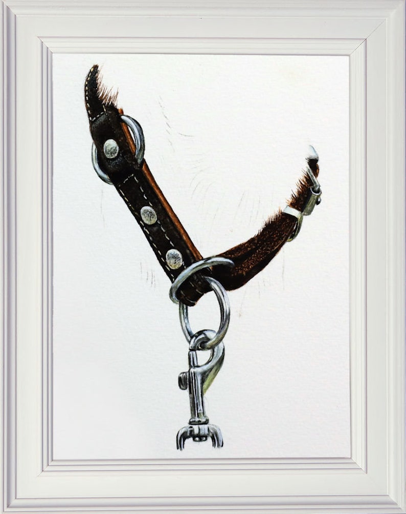 The completed painting of the dog's collar in a white frame.  This is a dark brown leather colour with paler stitching and silver studs, holding the rings and clasp.  These are painted too, and look shiny and silver.