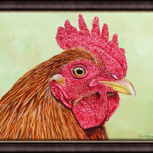 The cockerel painting in a dark brown frame with a duller brown inner edge.