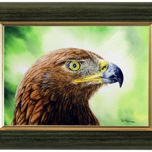 The original artwork in a green frame with a gold trim.