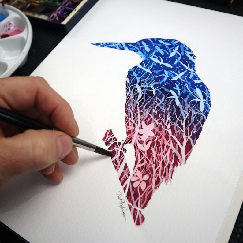 A colourful silhouette painting of a Kingfisher.  The top half of the silhouette has been painted blue, and this gradually changes to a darky pinky red at the bottom.  The whole silhouette is filled with outlines of dragonflies and flowers.
