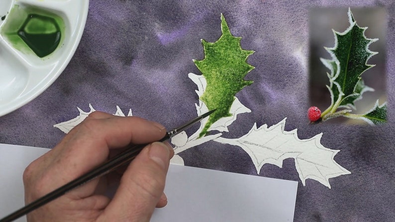 The background is painted and dry in this photo, and Paul is working with a smaller brush and some green paint to apply a bright wash to one of the leaves.