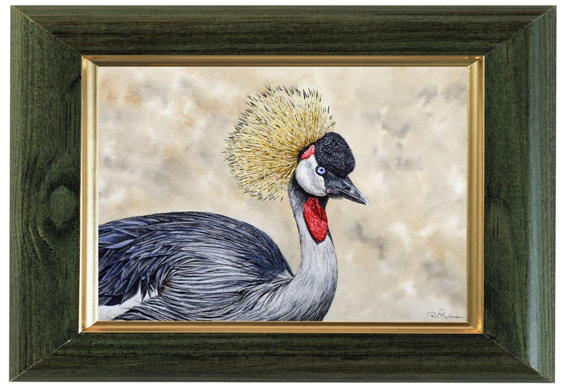 The crane portrait in a green frame with a gold trim on the inside edge.