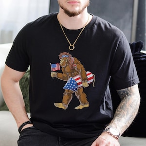 Bigfoot 4th of July Shirt, Bigfoot Merica Shirt, Patriotic Bigfoot Shirt, Sasquatch Flag Shirt, Independence Shirt, Funny 4th July Tee