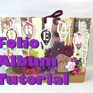 Op de afbeelding: Een handgemaakt folio-album met een decoratief ontwerp. Het album bevat een collage van patroonpapier, bloemversieringen en luchtballonaccenten. De tekst "Folio Album Tutorial" wordt in het paars weergegeven.