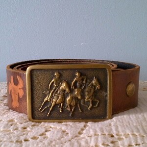 Tommy hilfiger belt leather logo with center hotsell bar buckle