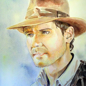 May include: Watercolor painting of a man wearing a brown fedora hat. The man has short brown hair and a beard. He is looking down and to the left. The background is a light blue watercolor wash.