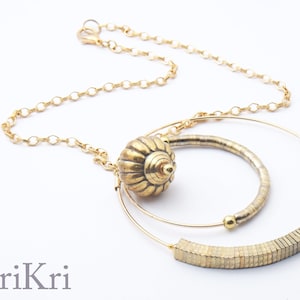 Korte gouden ketting met ringen