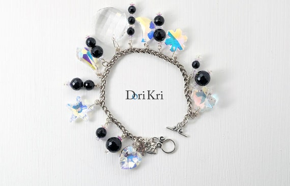 Swarovski lucky charm bracelet deals