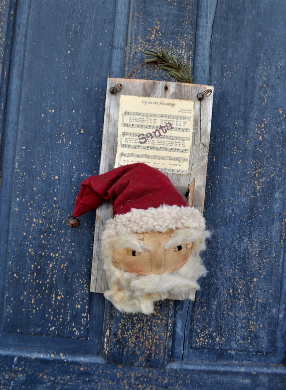 Primitive Santa on a Barnboard