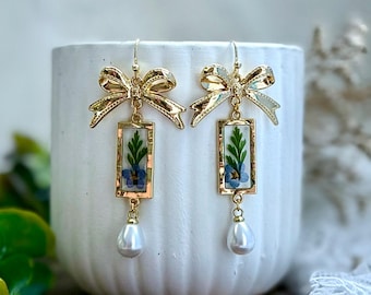 Gold Bow Earrings with Real Flowers in Resin & Dangly Pearl | Nature-Inspired Jewelry | Elegant Handmade Earrings