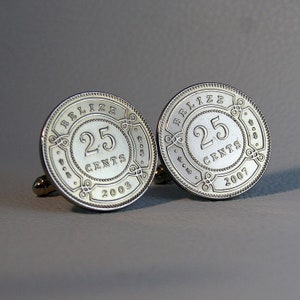 May include: Two silver cufflinks featuring Belize 25 cents coins, one from 2003 and the other from 2007.