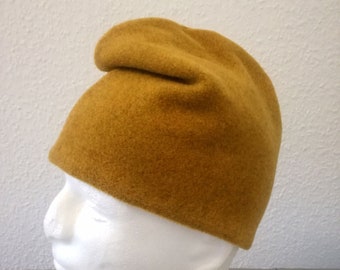 Phrygian wool cap made of mustard wool fabric.