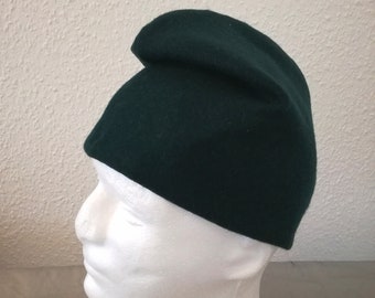 Phrygian cap made of green wool fabric.