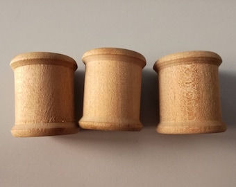 Old wooden thread coils