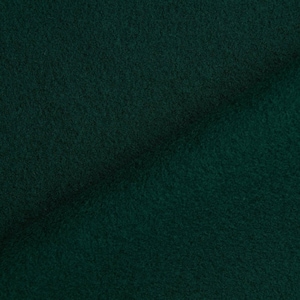 Tissu en laine 100% naturelle de couleur vert foncé.