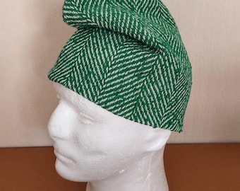 Phrygian cap made of white and green herringbone wool fabric.