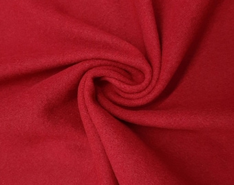 100% pure wool fabric in red color.