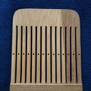 Loom made of wood.