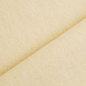 Tissu 100% laine naturelle de couleur écru.