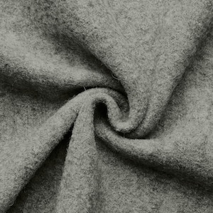 Walkloden - 100% pure wool fabric in a soft grey color.