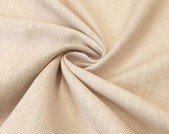 100 % natürliches Leinen mit Fischgrätenmuster in Beige.