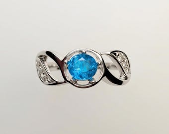 0.86ct Natural paraiba vivid blue Apatite, Gold, Platinum ring