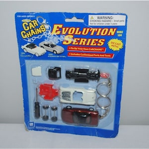 Vintage Car GM Corvette Diecast Metal Evolution Series Keychains Kit Sealed