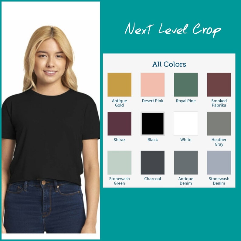 May include: A woman is wearing a black cropped t-shirt. The image shows a color chart with 12 different color options for the t-shirt. The colors include Antique Gold, Desert Pink, Royal Pine, Smoked Paprika, Shiraz, Black, White, Heather Gray, Stonewash Green, Charcoal, Antique Denim, and Stonewash Denim.
