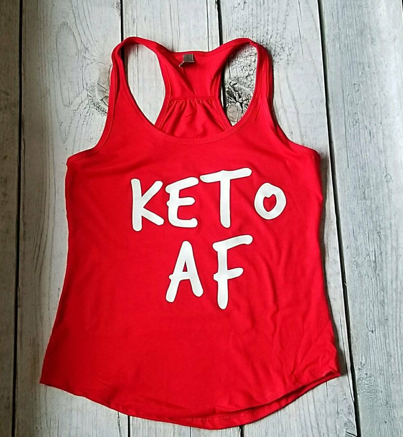 May include: Red tank top with white text that says "KETO AF".