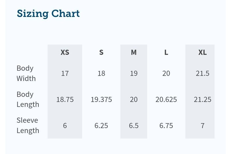 May include: Sizing chart for clothing with measurements in inches for body width, body length, and sleeve length. Sizes include XS, S, M, L, and XL.