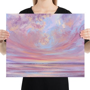 May include: A painting of a pink and purple sunset over a calm body of water. The sky is filled with fluffy clouds, and the water is a soft blue.