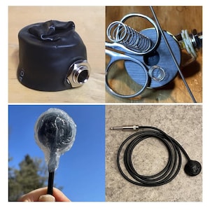 May include: A black cylindrical contact microphone housing with a silver input jack, internal metal springs, a clear plastic-wrapped circular sensor head, and a long black cable with a standard silver quarter-inch audio plug connector.
