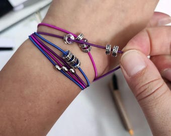 Pulsera metálica antiestrés con cuentas deslizantes - Joyería para aliviar el estrés
