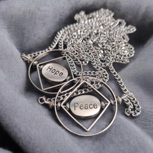 Repetitive soothing fidget toy necklace Gyroscope with spinner Hope Peace Unisex Gift for Fidgeters ADHD stim discreet Stressed friends
