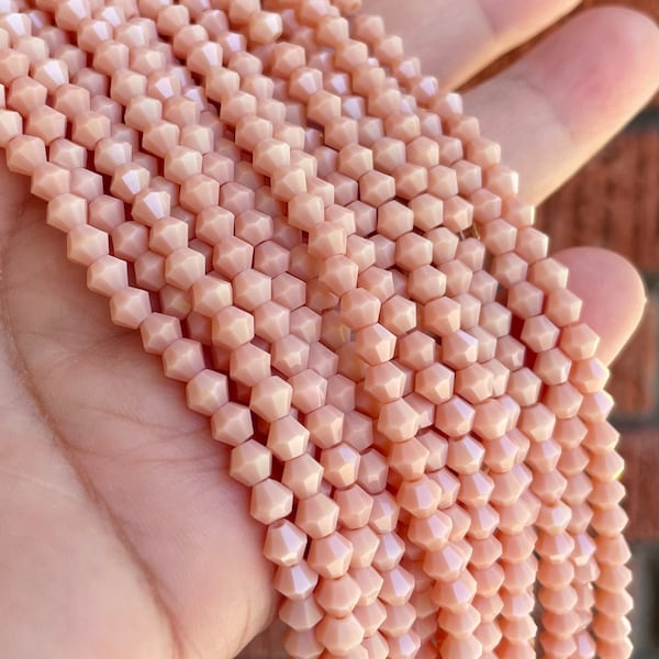 1 strand 4mm Bicone creamy peach opaque glass beads strand