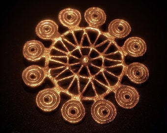 The CURONIAN SUN fibula, replica, Viking age