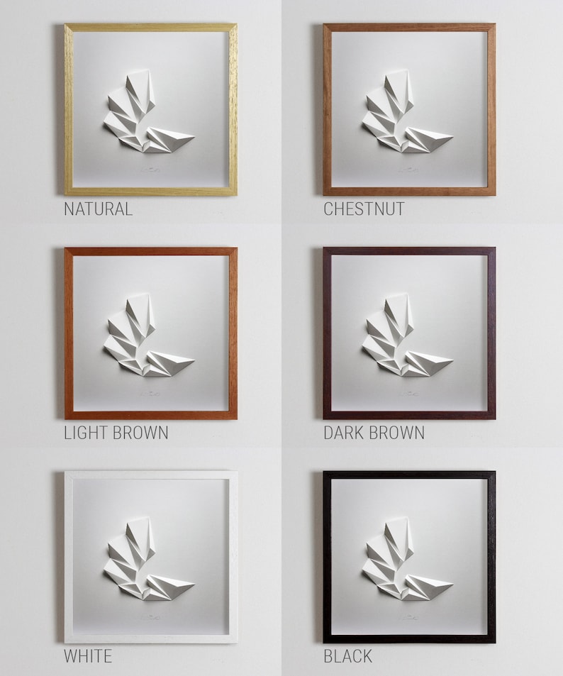 May include: A white paper sculpture of a geometric shape in a frame. The frame is available in six colors: natural, chestnut, light brown, dark brown, white, and black.