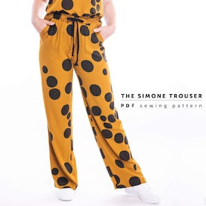 May include: A mustard yellow wide-leg trouser with a black polka dot pattern. The trouser has a drawstring waistband and pockets. The text "THE SIMONE TROUSER PDF sewing pattern" is displayed below the image.