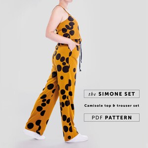 The Simone Set. A two-piece pattern with versatile styling options. Camisole top with two strap choices and a shaped hem. Slim-fit trousers with straight legs, an elasticated waist, and front slant pockets.