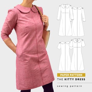 May include: A pink dress with a rounded collar, three-quarter length sleeves, and visible vertical seams. Next to the dress are technical line drawings of the garment and text that reads PAPER PATTERN THE KITTY DRESS sewing pattern.