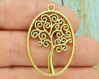 1 Tree charm blue and antique gold tone GC49