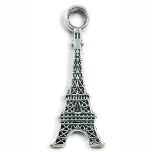 May include: Silver charm shaped like the Eiffel Tower with a loop at the top for attaching to a bracelet or necklace.