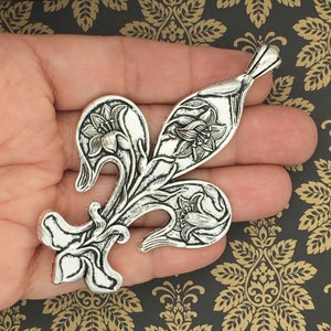 1 colgante de plata con forma de flor de lis de TIJC SP0029