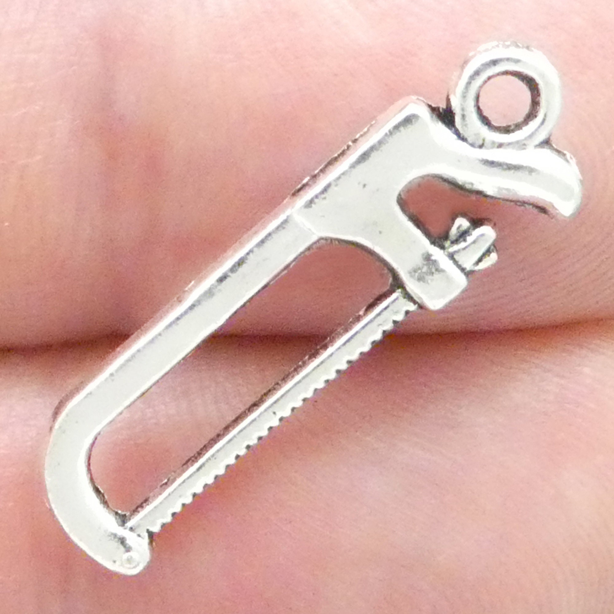 12 Silver Hacksaw Charm Tool Pendant 26x8mm by TIJC SP0495 12 Silver Hacksaw Charm Tool Pendant 26x8mm by TIJC SP0495