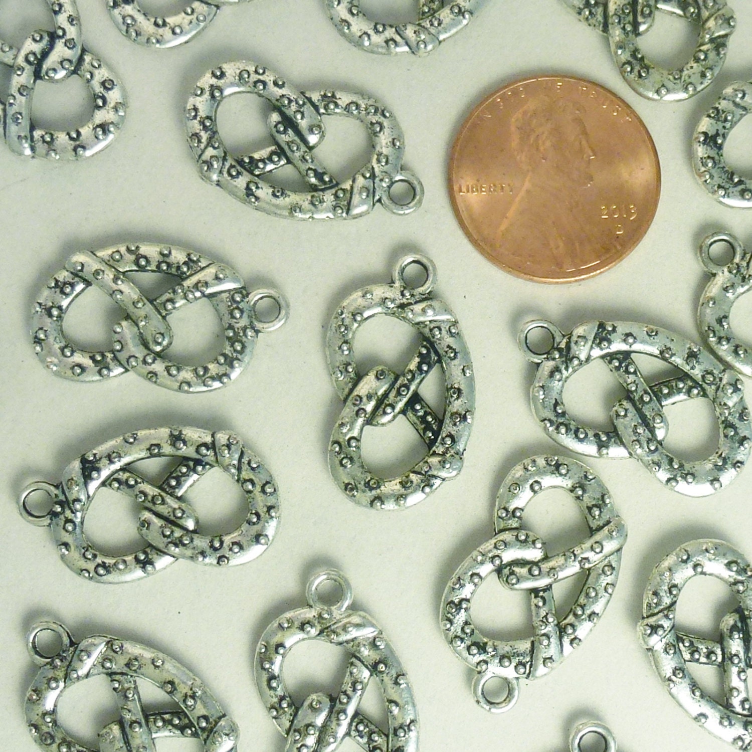 BULK 30 Silver Pretzel Charm 23x13mm by TIJC SP1031B - Etsy